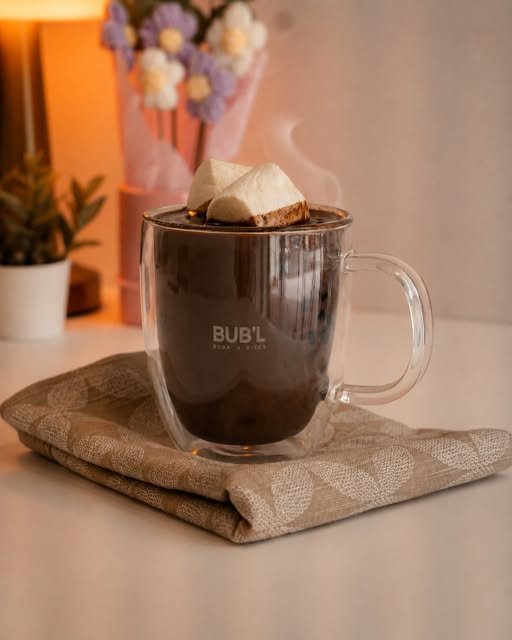 A warm BUB'L hot chocolate topped with toasted marshmallows